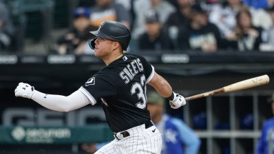 Chicago White Sox's Gavin Sheets watches his home run against the