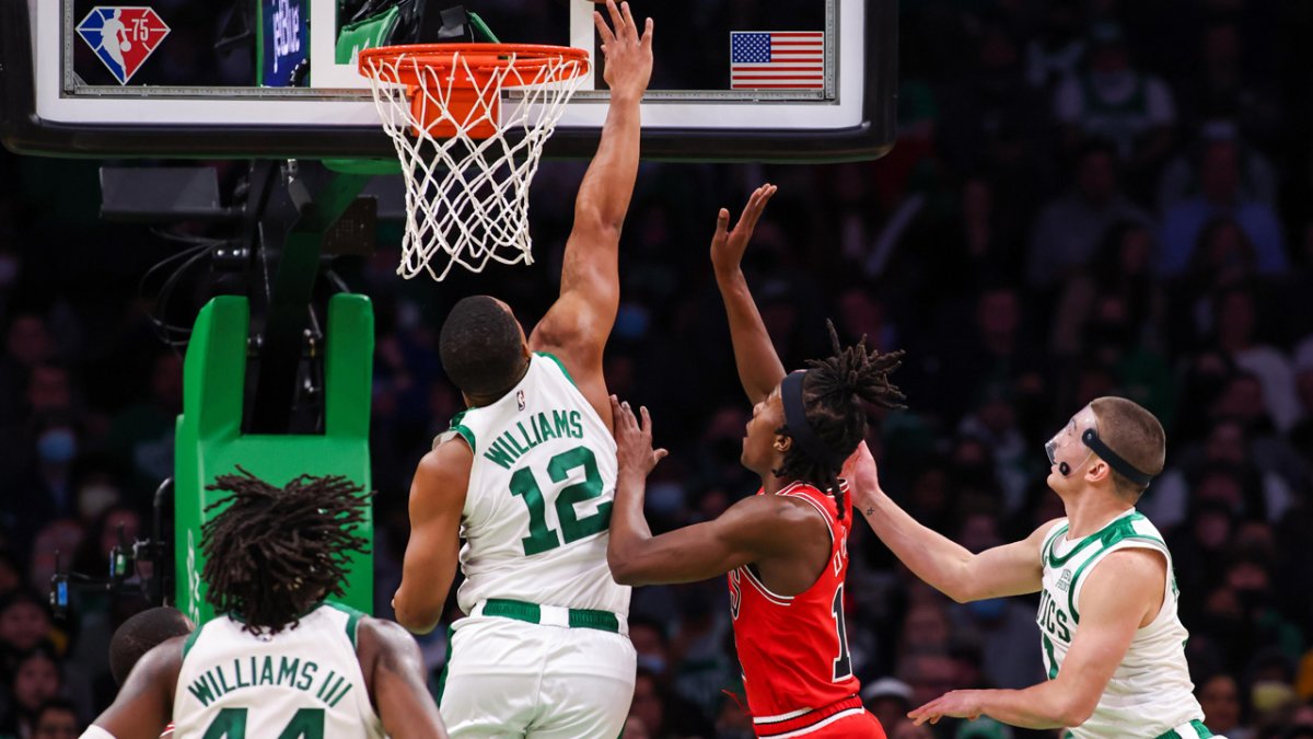 Ayo Dosunmu of the Chicago Bulls dunks the ball during the game