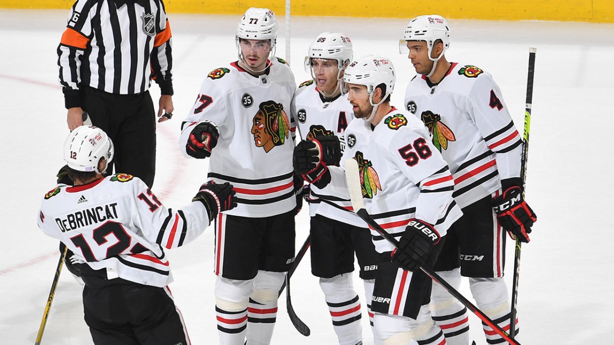 Blackhawks' Andrew Shaw ends career at 29 due to concussion risks