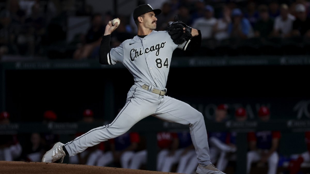 Chicago White Sox starting pitcher Dylan Cease (84) stands on the