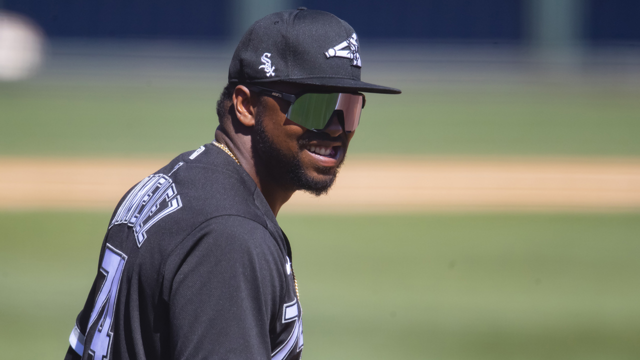 Chicago White Sox's Eloy Jimenez, left, celebrates with Luis