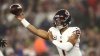 Justin Fields pulled off field with apparent injury
