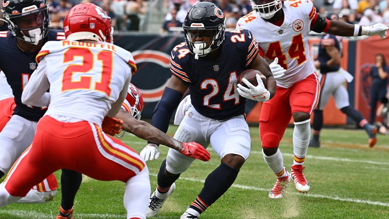 Khalil Herbert of the Chicago Bears runs with the ball during the