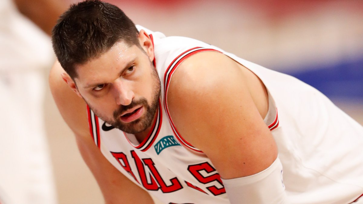 Chicago Bulls center Nikola Vucevic stands for his headshot during