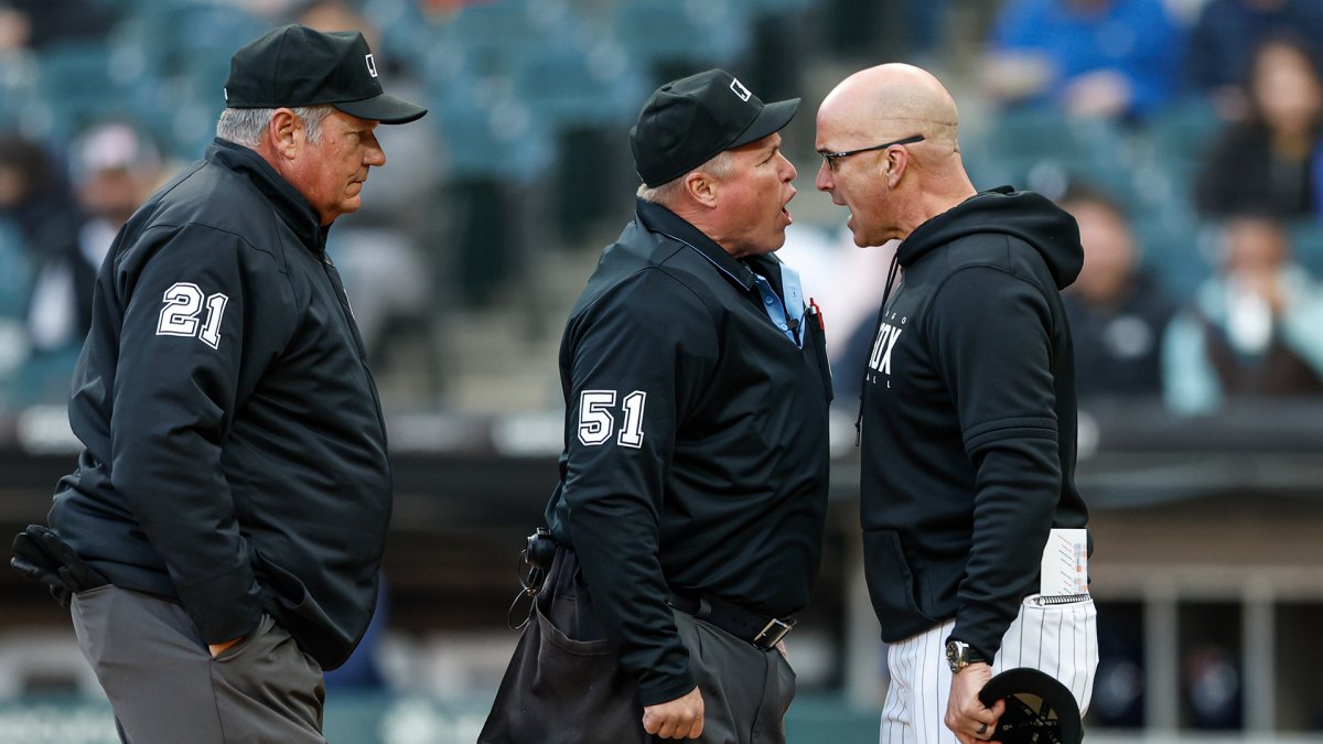 Chicago White Sox manager Pedro Grifol, left, talks to starting pitcher Lucas  Giolito after home plate umpire Marvin Hudson ejected Grifol from a  baseball game during the first inning against the Tampa