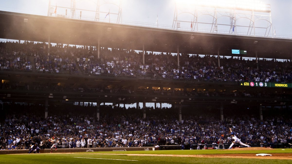 The Latest: Cubs to have full capacity at Wrigley next week