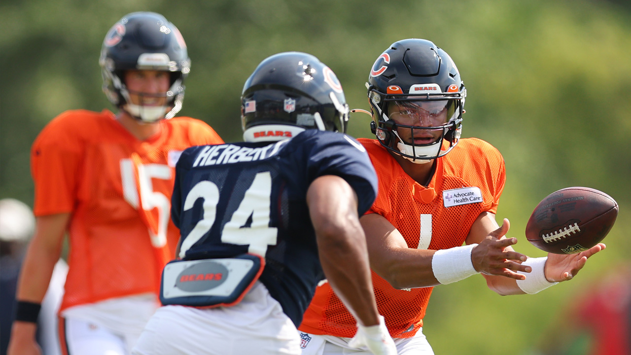 Khalil Herbert of the Chicago Bears runs with the ball during the News  Photo - Getty Images