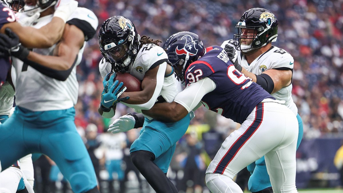 Houston Texans defensive lineman Rasheem Green (92) rushes during