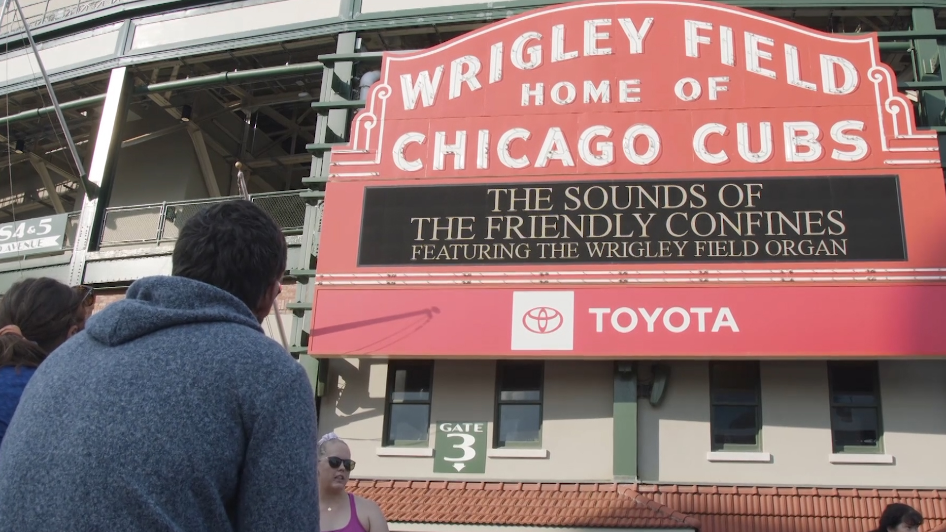 Watch the exact moment fans outside Wrigley Field learned the Cubs