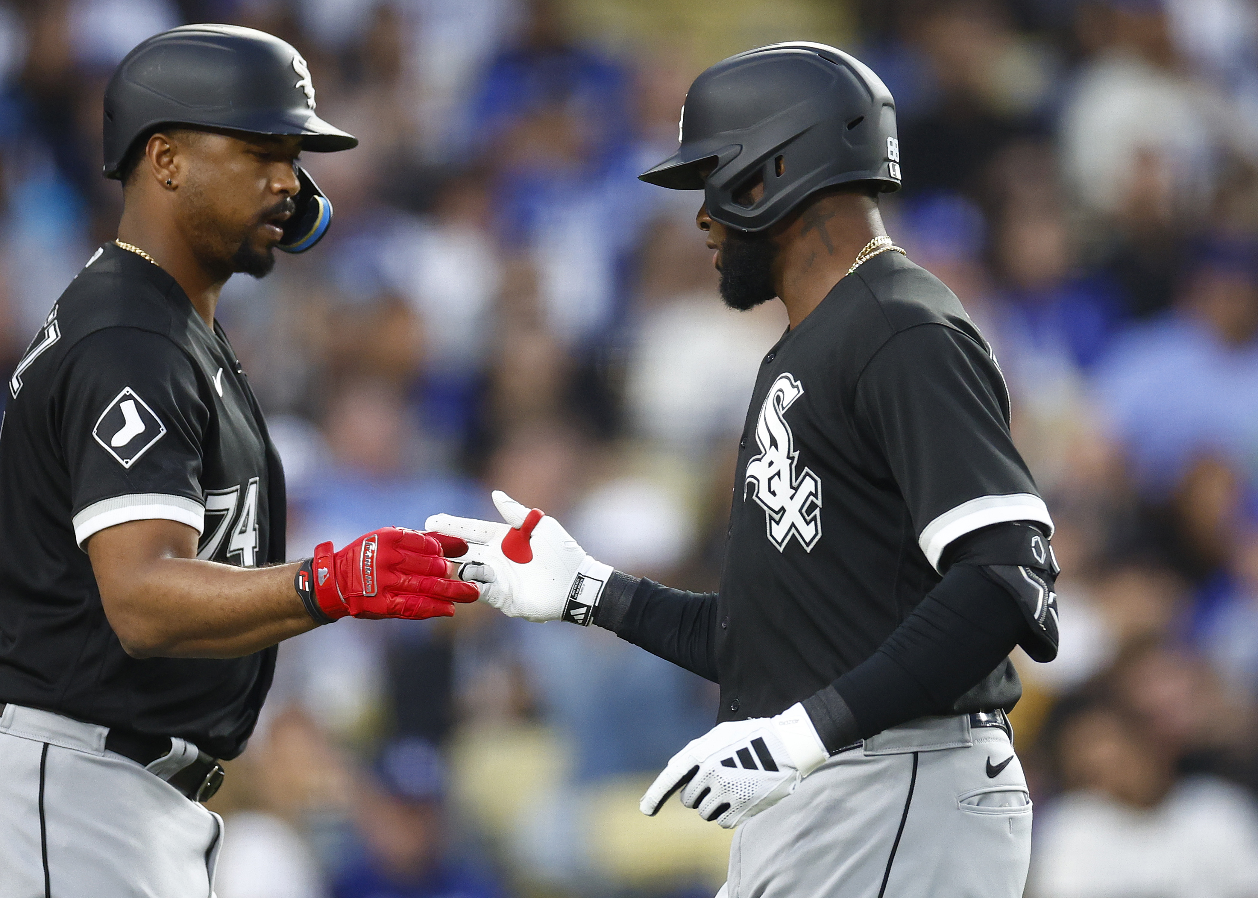 White Sox' Eloy Jimenez heating up at plate, but Luis Robert