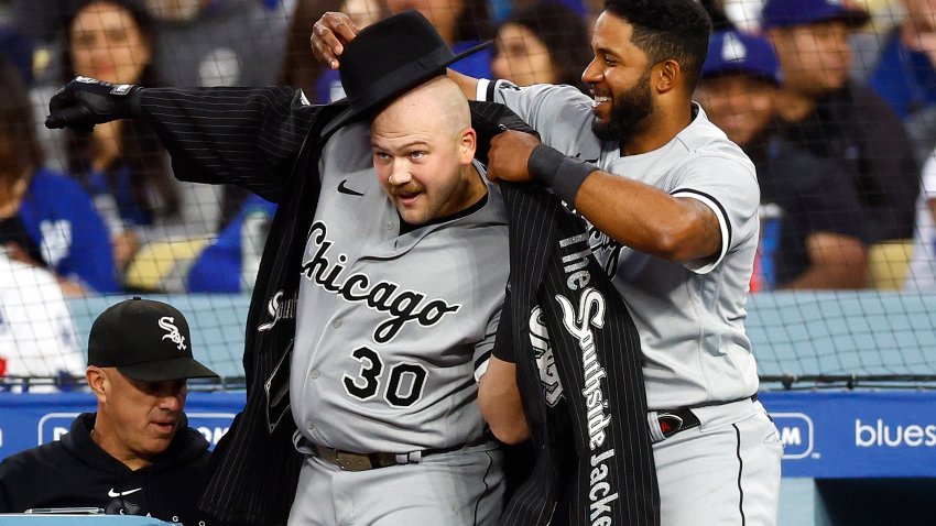 LOS ANGELES, CALIFORNIA – JUNE 15:  Jake Burger #30 of the Chicago White Sox celebrates a home run with Elvis Andrus #1 against the Chicago White Sox in the fourth inning at Dodger Stadium on June 15, 2023 in Los Angeles, California. (Photo by Ronald Martinez/Getty Images)