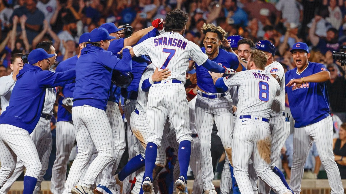 Twelve iconic images of Cubs' Christopher Morel walk-off – NBC Sports  Chicago