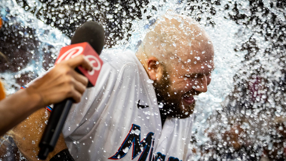 Miami Marlins' Jake Burger celebrates his home run during the