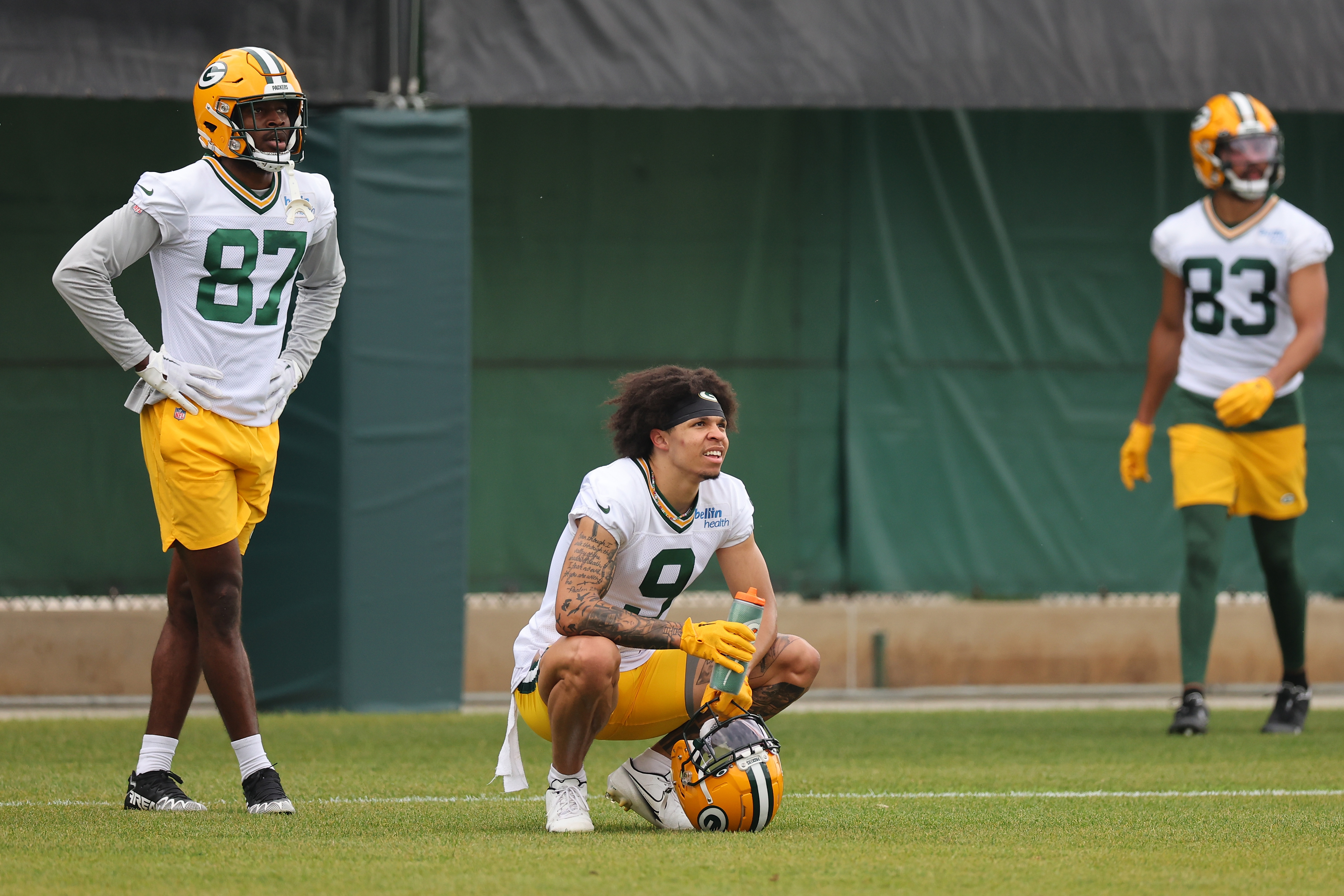 Green Bay, Wisconsin, USA. 18th Sep, 2022. Green Bay Packers wide receiver  Christian Watson (9) signs autographs before the NFL football game between  the Chicago Bears and the Green Bay Packers at