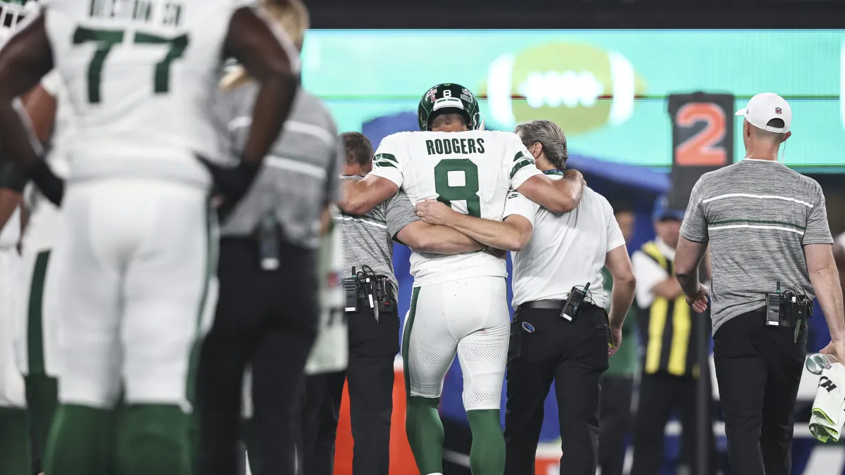 Jets' Aaron Rodgers Goes Down With Injury Early in 1st Quarter vs