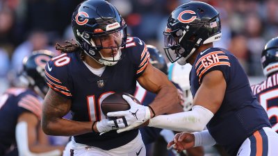 Justin Fields of the Chicago Bears reacts after a play during the News  Photo - Getty Images