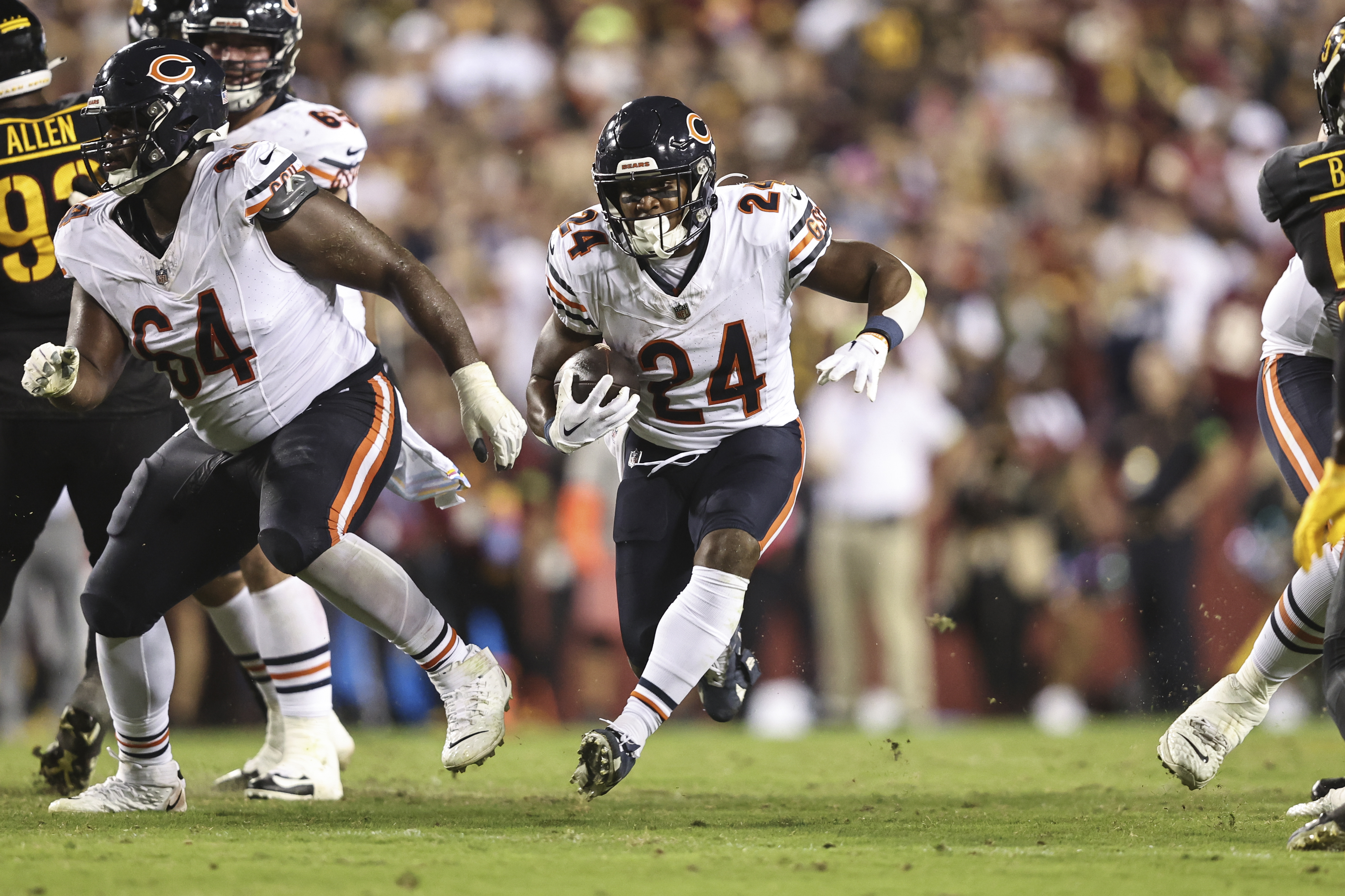 Khalil Herbert of the Chicago Bears runs with the ball during the News  Photo - Getty Images