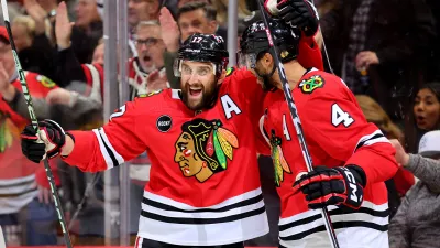 CHICAGO, ILLINOIS – DECEMBER 05: Nick Foligno #17 of the Chicago Blackhawks celebrates with Seth Jones #4 after scoring a goal against the Nashville Predators during the second period at the United Center on December 05, 2023 in Chicago, Illinois. (Photo by Michael Reaves/Getty Images)