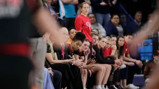 Players and staff on the Utah bench