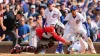 Santiago Espinal hits 2-run homer, Reds hold on to beat Cubs 5-4