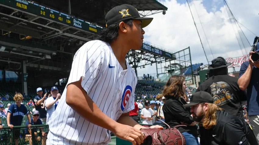 May 18, 2024; Chicago, Illinois, USA; Chicago Cubs pitcher Shota Imanaga (18) enters the field before the team’s game against the Pittsburgh Pirates at Wrigley Field. Mandatory Credit: Matt Marton-USA TODAY Sports