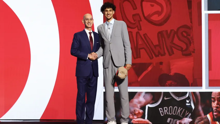 Zaccharie Risacher and Adam Silver