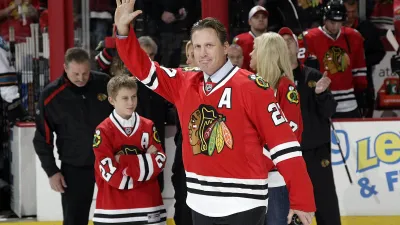 CHICAGO, IL – NOVEMBER 15:  Former Chicago Blackhawks player Jeremy Roenick comes out on the ice to drop the ceremonial puck drop before the game against the San Jose Sharks on November 15, 2009 at the United Center in Chicago, Illinois. (Photo by Bill Smith/NHLI via Getty Images)