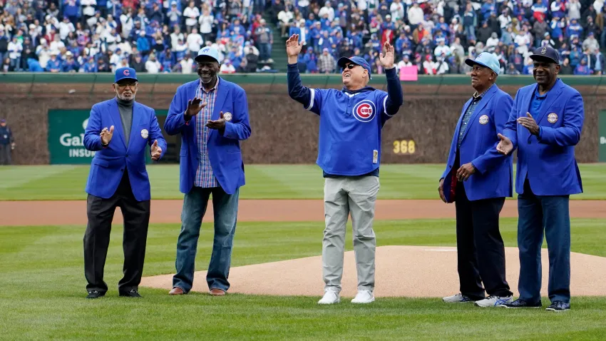 Apr 1, 2024; Chicago, Illinois, USA; L-R former Chicago Cubs Billy Williams, Lee Smith, Ryne Sandberg, Fergie Jenkins and Andre Dawson look on as Sandberg throws out the ceremonial first pitch before the game between the Chicago Cubs and the Colorado Rockies at Wrigley Field. Mandatory Credit: David Banks-USA TODAY Sports