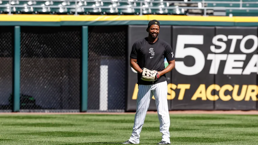 May 27, 2024; Chicago, Illinois, USA; Injured Chicago White Sox designated hitter Eloy Jimenez warms up before a baseball game against the Toronto Blue Jays at Guaranteed Rate Field. Mandatory Credit: Kamil Krzaczynski-USA TODAY Sports