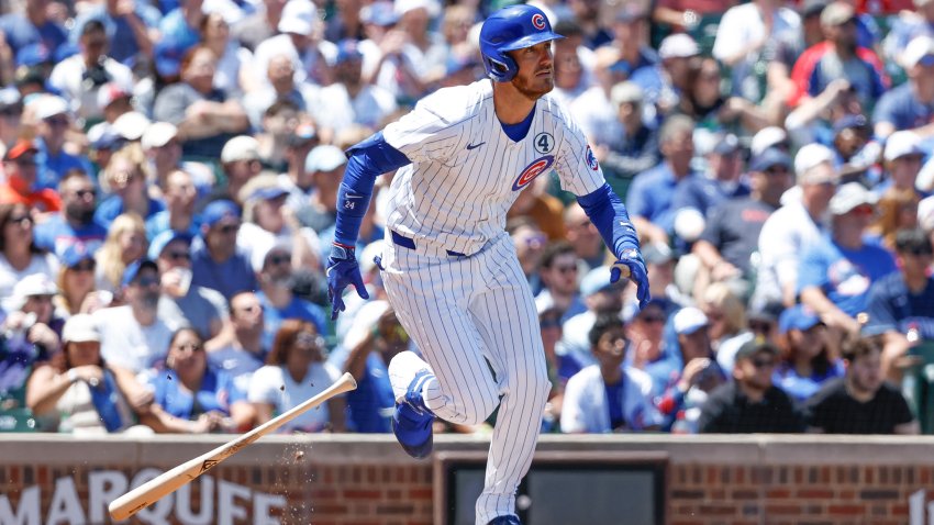 Jun 2, 2024; Chicago, Illinois, USA; Chicago Cubs outfielder Cody Bellinger (24) singles against the Cincinnati Reds during the first inning at Wrigley Field. Mandatory Credit: Kamil Krzaczynski-USA TODAY Sports