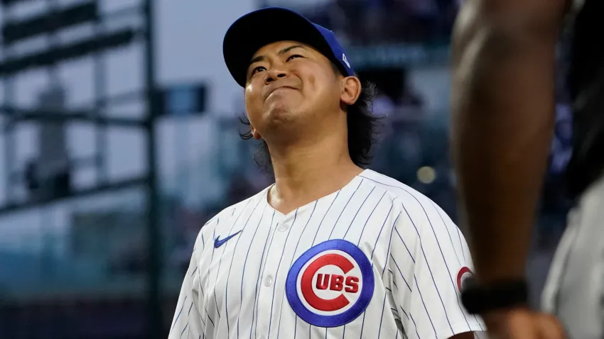 Jun 4, 2024; Chicago, Illinois, USA; Chicago Cubs pitcher Shota Imanaga (18) grimaces after giving up an infield single against the Chicago White Sox during the second inning at Wrigley Field. Mandatory Credit: David Banks-USA TODAY Sports