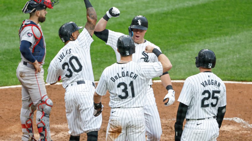 Jun 8, 2024; Chicago, Illinois, USA; Chicago White Sox outfielder Gavin Sheets (32) celebrates with teammates after hitting a grand slam against the Boston Red Sox during the fifth inning at Guaranteed Rate Field. Mandatory Credit: Kamil Krzaczynski-USA TODAY Sports