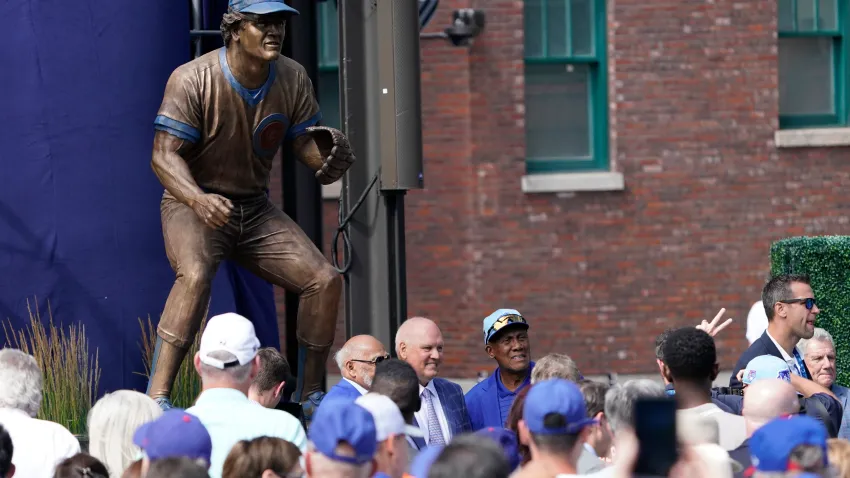 Jun 23, 2024; Chicago, Illinois, USA; Ryne Sandberg (center) stands in front of his statue during the dedication ceremony before the game between the Chicago Cubs and the New York Mets at Wrigley Field. Mandatory Credit: David Banks-USA TODAY Sports