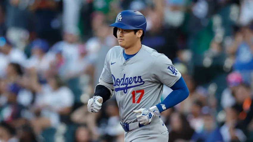 Jun 26, 2024; Chicago, Illinois, USA; Los Angeles Dodgers designated hitter Shohei Ohtani (17) rounds the bases after hitting a solo home run against the Chicago White Sox during the first inning at Guaranteed Rate Field. Mandatory Credit: Kamil Krzaczynski-USA TODAY Sports