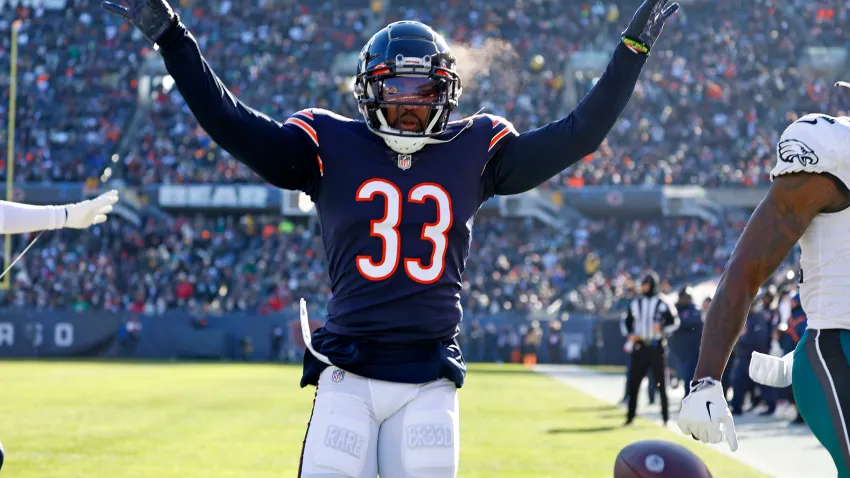 Dec 18, 2022; Chicago, Illinois, USA; Chicago Bears cornerback Jaylon Johnson (33) reacts after a play against the Philadelphia Eagles during the second quarter at Soldier Field. Mandatory Credit: Mike Dinovo-USA TODAY Sports