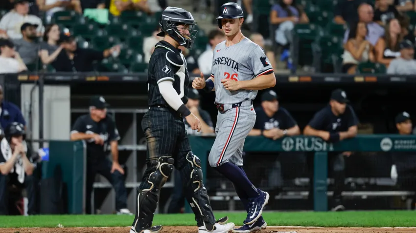 Jul 8, 2024; Chicago, Illinois, USA; Minnesota Twins outfielder Max Kepler (26) scores against the Chicago White Sox during the 11th inning at Guaranteed Rate Field. Mandatory Credit: Kamil Krzaczynski-USA TODAY Sports