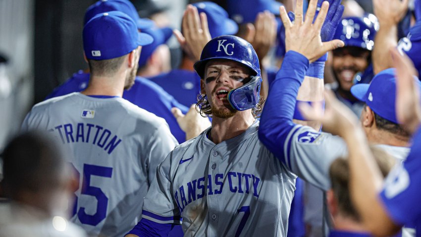 Jul 28, 2024; Chicago, Illinois, USA; Kansas City Royals shortstop Bobby Witt Jr. (7) celebrates with teammates after hitting a grand slam against the Chicago White Sox during the eight inning at Guaranteed Rate Field. Mandatory Credit: Kamil Krzaczynski-USA TODAY Sports