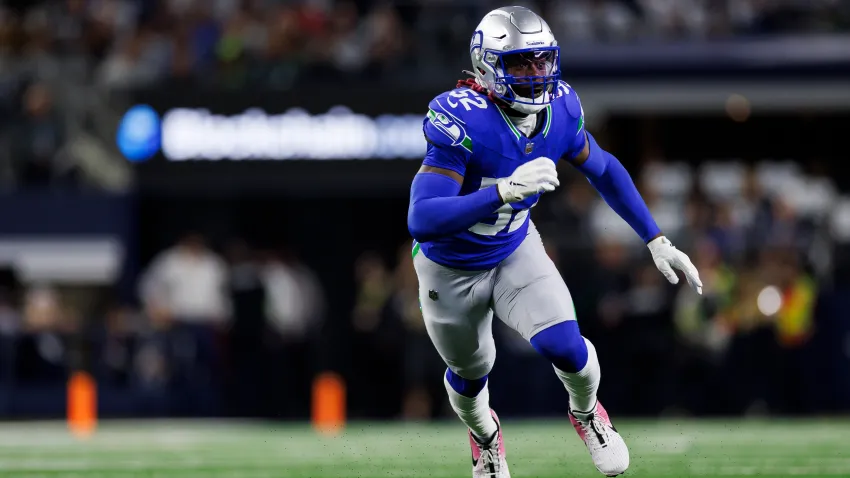 ARLINGTON, TEXAS – NOVEMBER 30: Darrell Taylor #52 of the Seattle Seahawks runs around the edge during an NFL football game against the Dallas Cowboys at AT&T Stadium on November 30, 2023 in Arlington, Texas. (Photo by Ryan Kang/Getty Images)