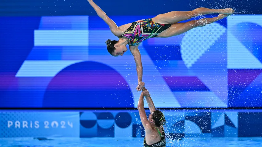 Team Australia compete in the team acrobatic routine of the artistic swimming event