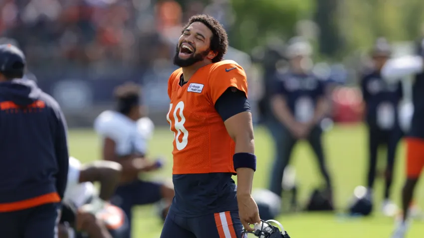 Chicago Bears quarterback Caleb Williams jokes with teammates during training camp at Halas Hall on Wednesday, Aug. 7, 2024, in Lake Forest, Illinois. (Stacey Wescott/Chicago Tribune/Tribune News Service via Getty Images)