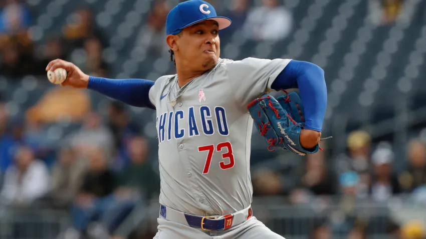 May 12, 2024; Pittsburgh, Pennsylvania, USA;  Chicago Cubs relief pitcher Adbert Alzolay (73) pitches against the Pittsburgh Pirates during the tenth inning at PNC Park. The Cubs won 5-4 in ten innings. Mandatory Credit: Charles LeClaire-USA TODAY Sports