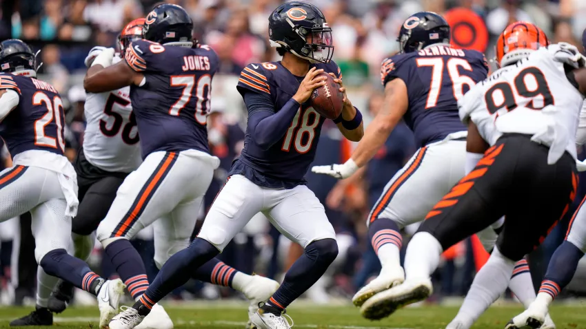 Aug 17, 2024; Chicago, Illinois, USA; Chicago Bears quarterback Caleb Williams (18) drops back to throw in the first quarter of the NFL Preseason Week 2 game between the Chicago Bears and the Cincinnati Bengals at Soldier Field. Mandatory Credit: Sam Greene-USA TODAY Sports