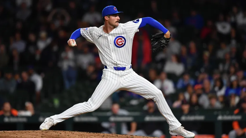 Aug 21, 2024; Chicago, Illinois, USA; Chicago Cubs relief pitcher Jack Neely (47) makes his first pitch in his MLB debut during the ninth inning against the Detroit Tigers at Wrigley Field. Mandatory Credit: Patrick Gorski-USA TODAY Sports