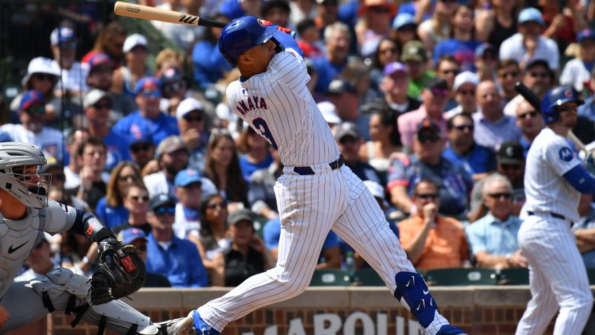 Aug 22, 2024; Chicago, Illinois, USA; Chicago Cubs catcher Miguel Amaya (9) hits a grand slam during the second inning against the Detroit Tigers at Wrigley Field. Mandatory Credit: Patrick Gorski-USA TODAY Sports