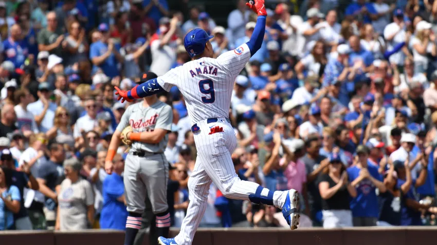 Aug 22, 2024; Chicago, Illinois, USA; Chicago Cubs catcher Miguel Amaya (9) celebrates his grand slam while rounding the bases during the second inning against the Detroit Tigers at Wrigley Field. Mandatory Credit: Patrick Gorski-USA TODAY Sports