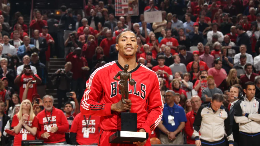 CHICAGO, IL – MAY 04: 2011 NBA MVP Derrick Rose #1 of the Chicago Bulls poses with KIA Motors NBA MVP Trophy prior to Game Two of the Eastern Conference Semifinals between the Atlanta Hawks and the Chicago Bulls on May 4, 2011 in the 2011 NBA Playoffs at the United Center in Chicago, Illinois. NOTE TO USER: User expressly acknowledges and agrees that, by downloading and/or using this photograph, user is consenting to the terms and conditions of the Getty Images License Agreement.  Mandatory Copyright Notice: Copyright 2011 NBAE (Photo by Nathaniel S. Butler/NBAE via Getty Images)