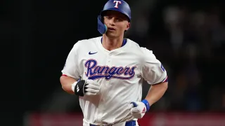 ARLINGTON, TEXAS – AUGUST 19: Corey Seager #5 of the Texas Rangers runs the bases after hitting a solo home run during the first inning against the Pittsburgh Pirates at Globe Life Field on August 19, 2024 in Arlington, Texas.