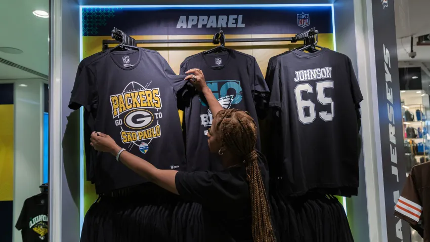 A Green Bay Packers t-shirt for sale at a NFL Fanatics pop-up store at the Morumbi Shopping mall ahead of the Philadelphia Eagles versus the Green Bay Packers football game in Sao Paulo, Brazil, on Friday, Aug. 30, 2024. The NFL is hosting its first game in South America, where football dominates and the American version is a niche sport. Photographer: Tuane Fernandes/Bloomberg via Getty Images