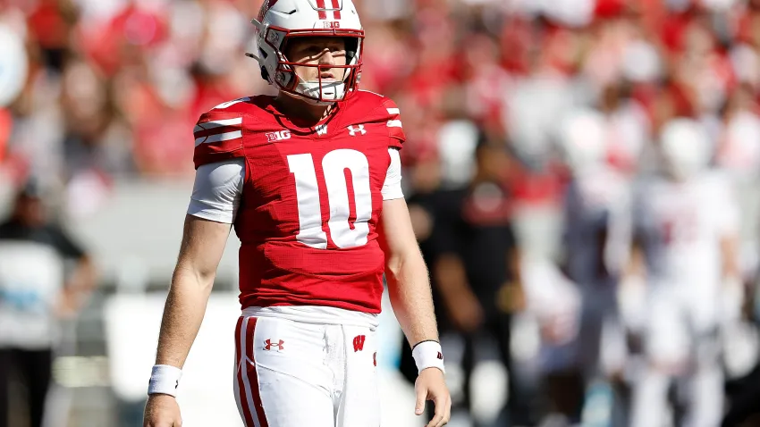 MADISON, WISCONSIN – SEPTEMBER 07: Tyler Van Dyke #10 of the Wisconsin Badgers looks over toward the bench during the game against the South Dakota Coyotes at Camp Randall Stadium on September 07, 2024 in Madison, Wisconsin. (Photo by John Fisher/Getty Images)