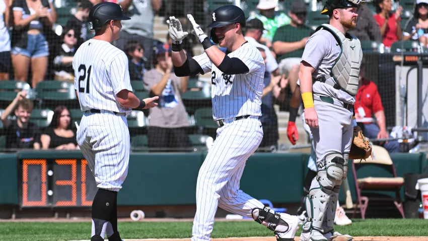 CHICAGO, ILLINOIS – SEPTEMBER 15: Gavin Sheets #32 of the Chicago White Sox is congratulated by Andrew Vaughn #21 following a two run home run during the first inning of a game against the Oakland Athletics at Guaranteed Rate Field on September 15, 2024 in Chicago, Illinois. (Photo by Nuccio DiNuzzo/Getty Images)